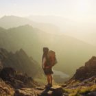 Image of person backpacking for Cultivate Faith as a Powerful Tool for Growth by Kelley Grimes at Cultivating Peace and Joy