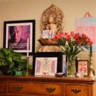 Image of Buddha, art, and flowers representing self-nurturing